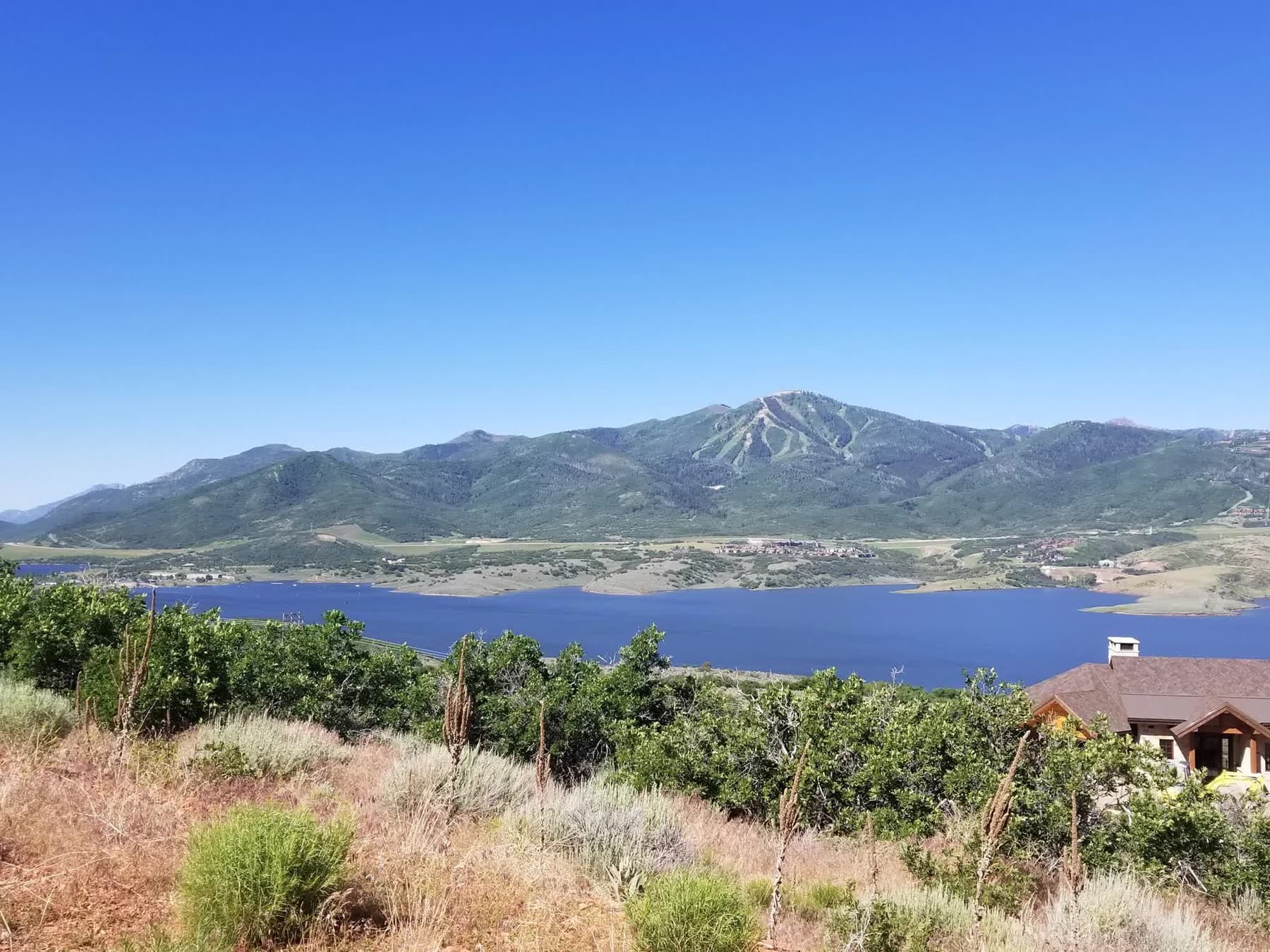 Homes and open meadow at Hideout Canyon above the Jordanelle